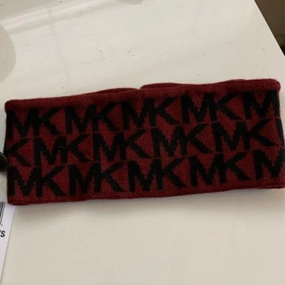 Michael Kors signature headband in a burgundy and black MK logo print